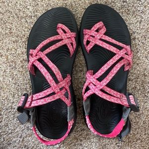 Pink and white Chacos